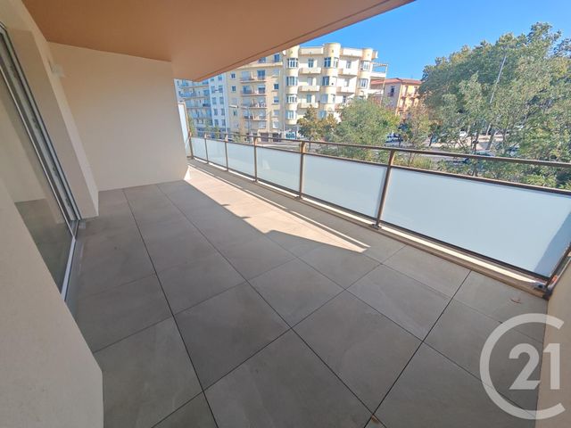 Appartement F3 à louer - 3 pièces - 67.15 m2 - PERPIGNAN - 66 - LANGUEDOC-ROUSSILLON - Century 21 Côte Catalane Immobilier